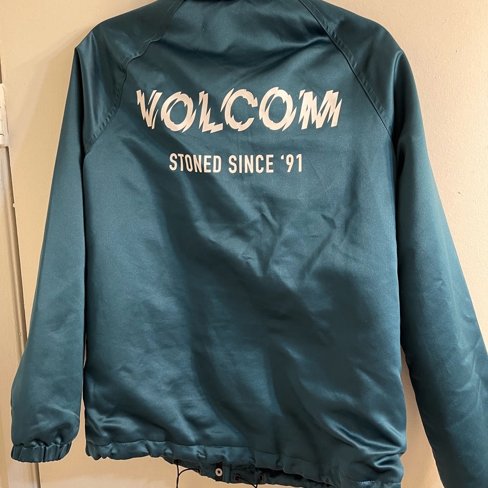 Green satin Volcom jacket.